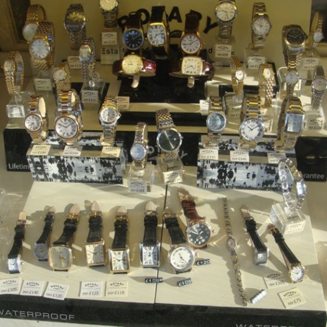 I'Anson Jewellers & Goldsmiths The Rotary window on Beulah Street, price-tagged and lit.